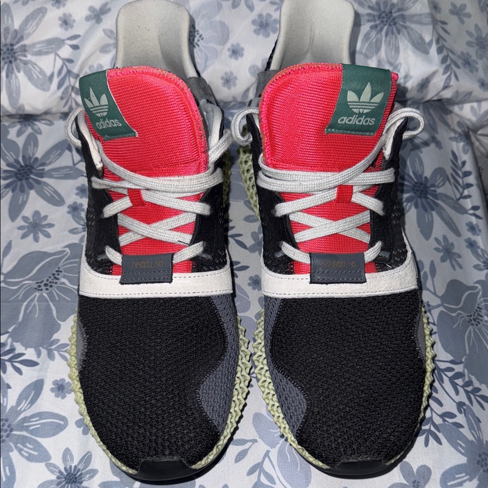 Adidas Black and Red Sneakers with Green Accents